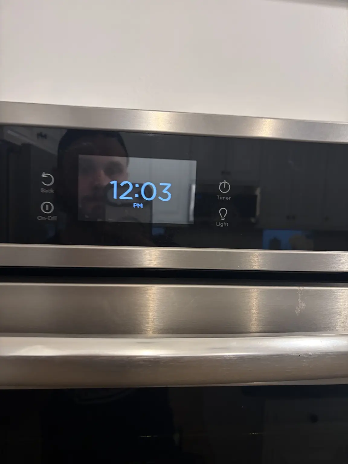KitchenAid double oven clock and control panel illuminated after repair in Wellington Florida
