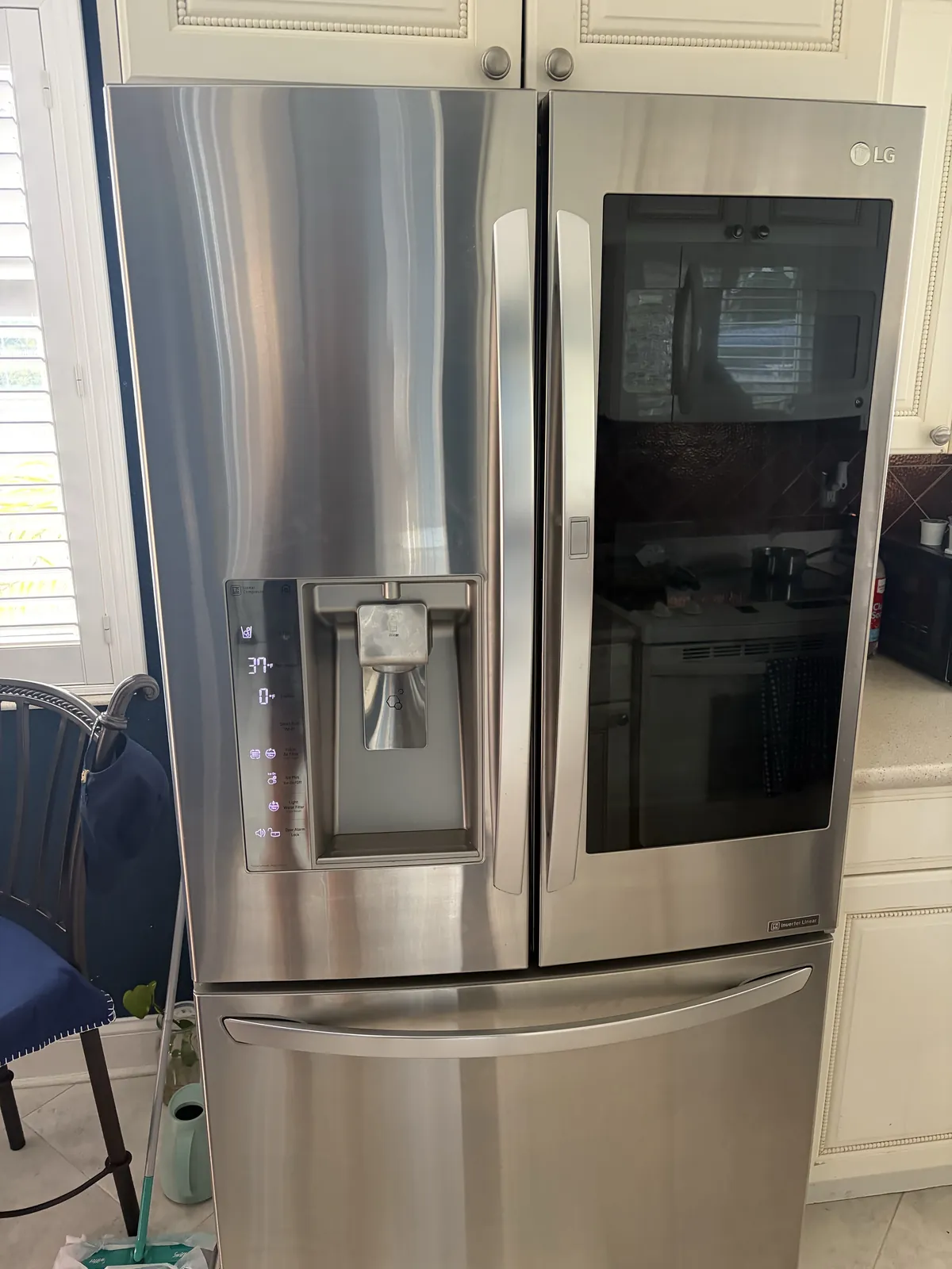 LG InstaView French-door refrigerator in a Deerfield Beach Florida kitchen after compressor replacement