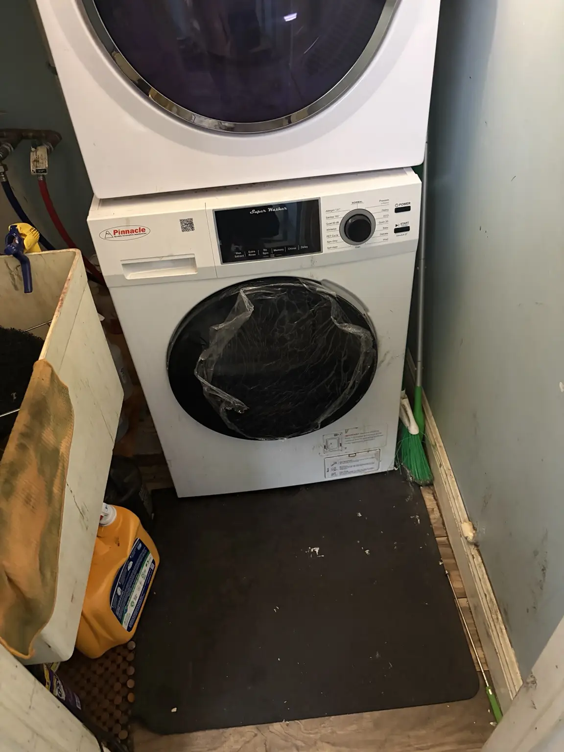New Pinnacle washer door installed with protective film still in place