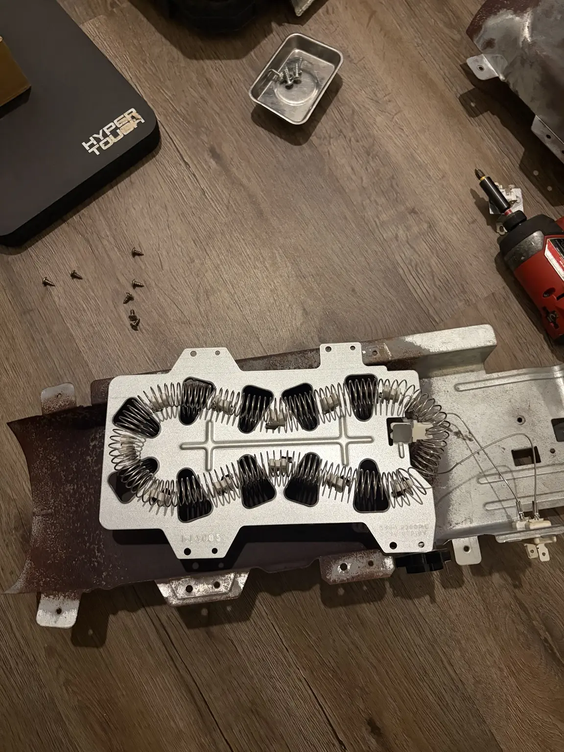 Samsung dryer heating element removed during repair in Deerfield Beach