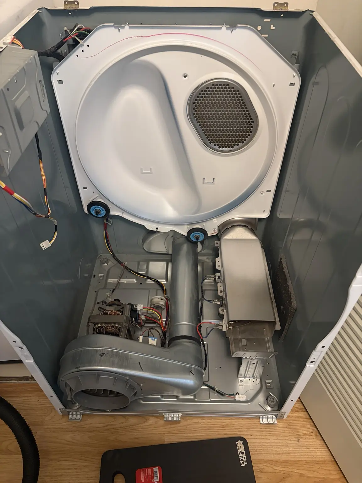 Samsung dryer internal components exposed for lint cleaning and maintenance