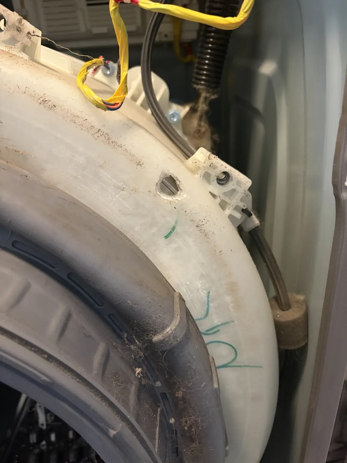 Broken counterweight mounting point on a Samsung washer front outer tub in Pompano Beach