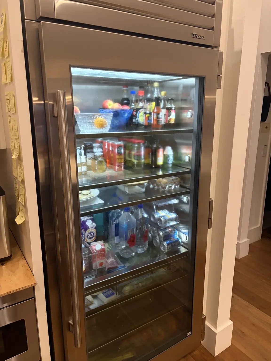 True commercial-grade glass-door refrigerator serviced in a Wellington Florida residence