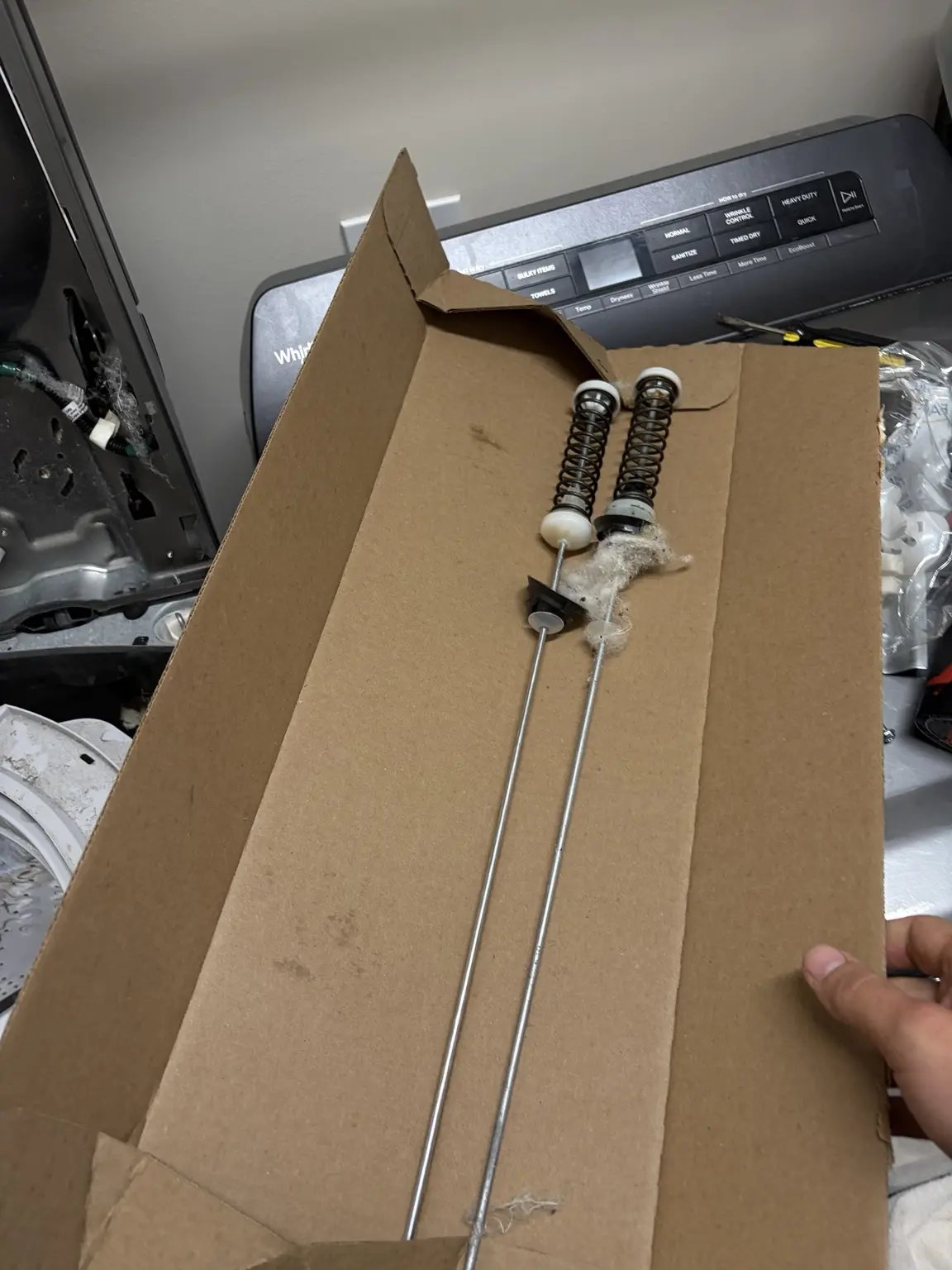 Whirlpool washer suspension rods replaced during repair in Westlake Florida